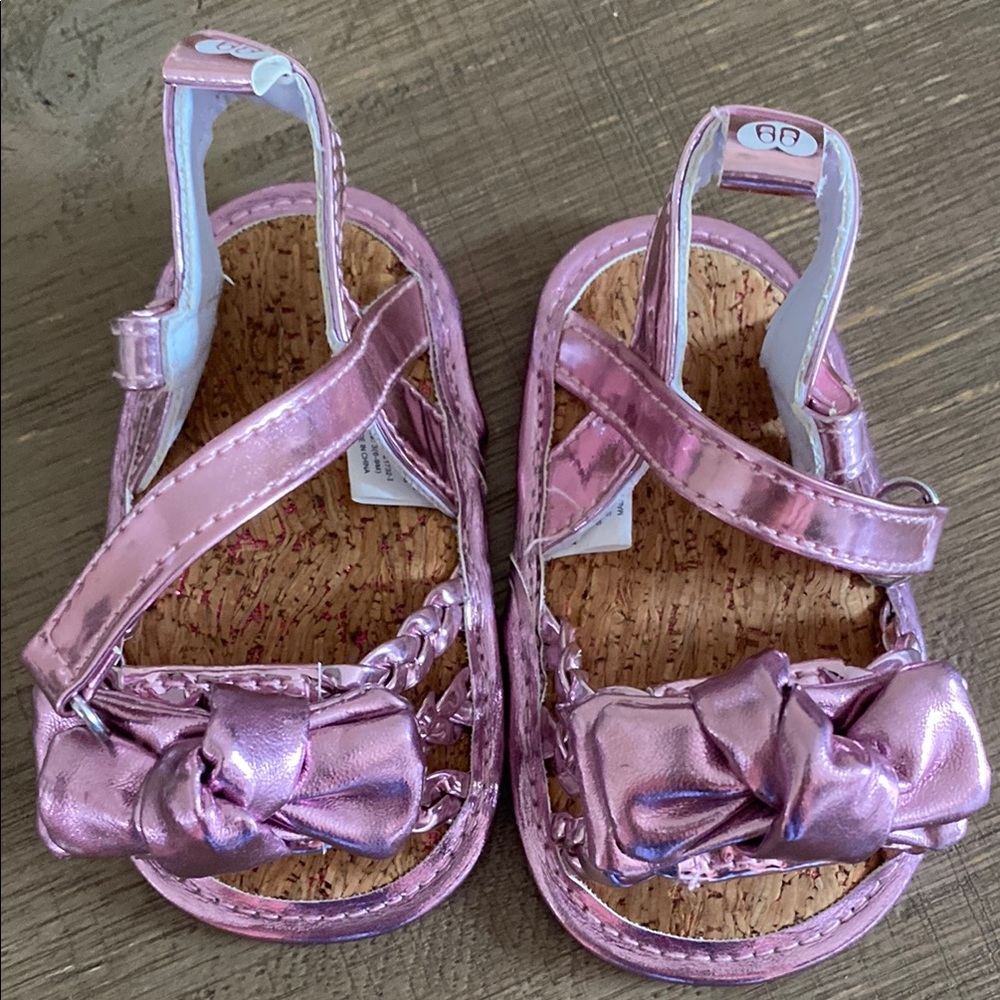 Metallic Pink Sandals with Decorative Bows and Cork Soles
